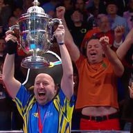 Team Europe captain Marcus Chamat holds aloft the Mosconi Cup