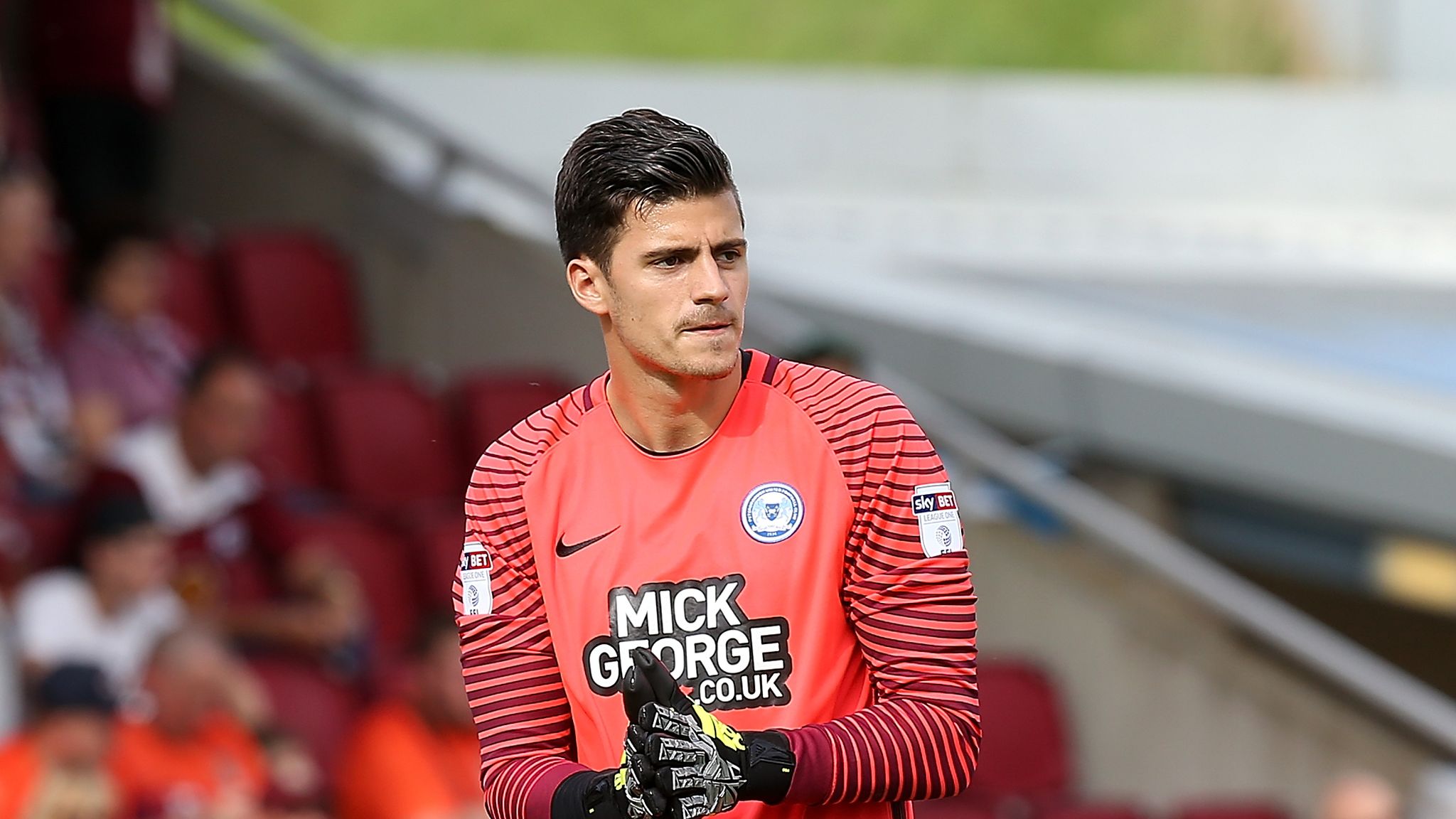 Reading 'keeper Jonathan Bond to stay on loan at Peterborough ...