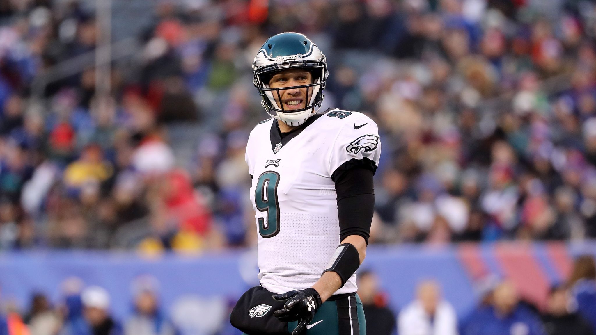 Philadelphia Eagles quarterback Nick Foles (9) holds up the Vince