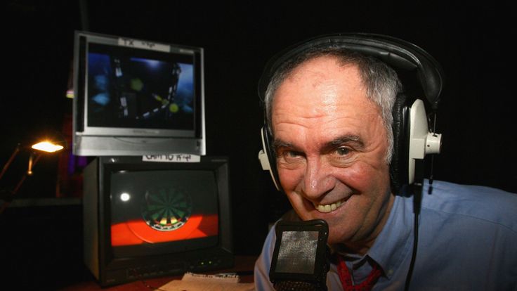 Commentator Sid Waddell poses before the the first round match between Phil Taylor of England and Michael van Gerwen of Netherlands 