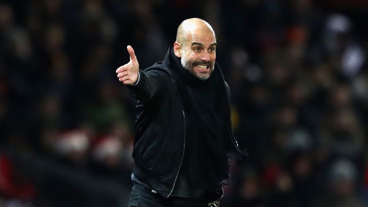 Pep Guardiola reacts during the derby match at Old Trafford