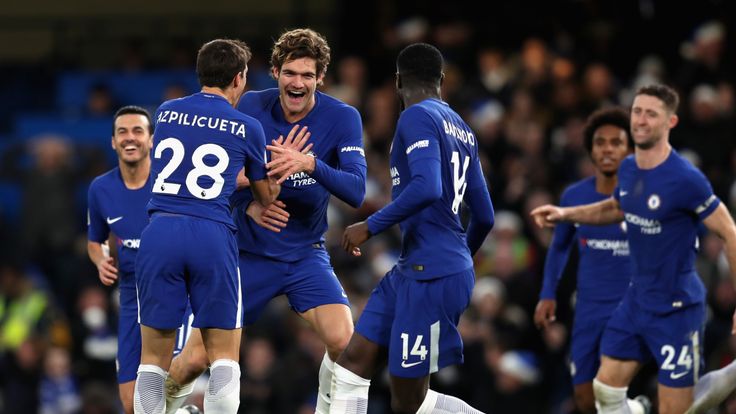Marcos Alonso celebrates with team-mates after giving Chelsea a 1-0 lead