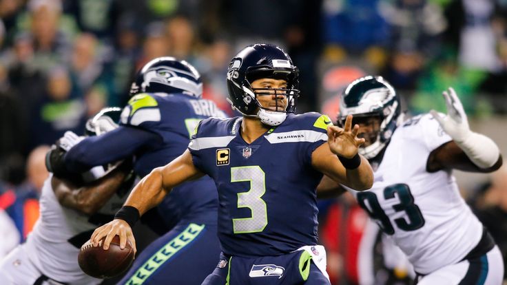 SEATTLE, WA - DECEMBER 03: Quarterback Russell Wilson #3 of the Seattle Seahawks passes against the Philadelphia Eagles at CenturyLink Field on December 3,