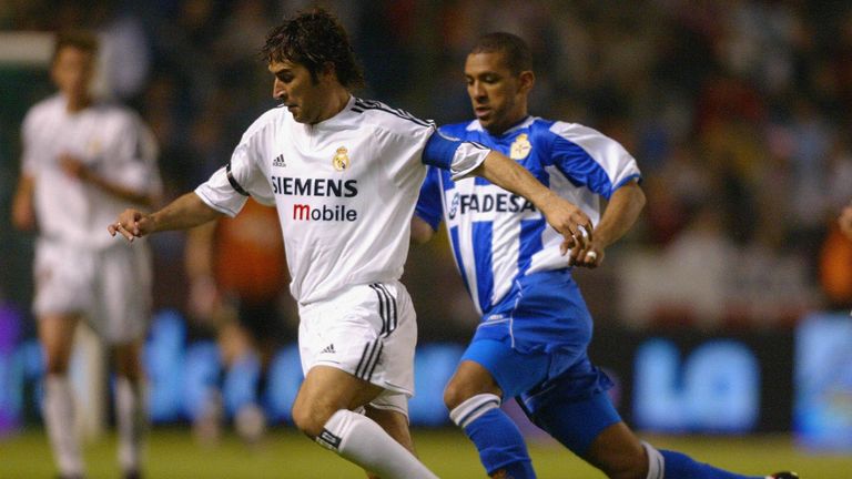 Deportivo La Coruna's Brazilian player Djalminha vies with Real Madrid's Raul in a Liga match in La Coruna in May 2004.