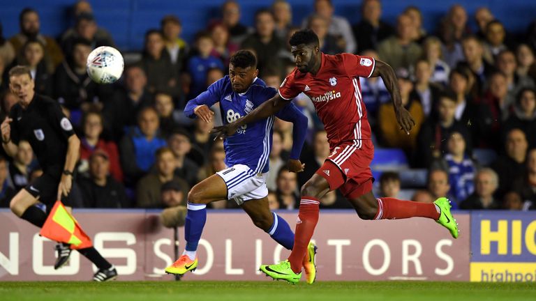 Isaac Vassell of Birmingham is tackled by Bruno Manga of Cardiff during a Sky Bet Championship match in October 2017