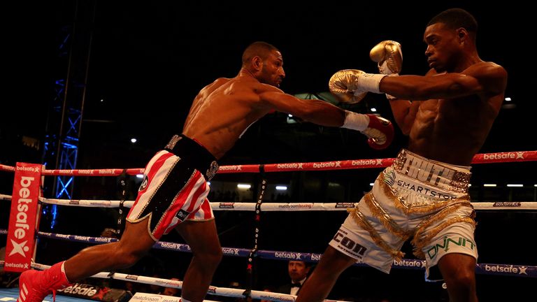 SHEFFIELD, ENGLAND - MAY 27:    Kell Brook (L) in action against Errol Spence JR during their IBF Welterweight World Championship contest at Bramall Lane o