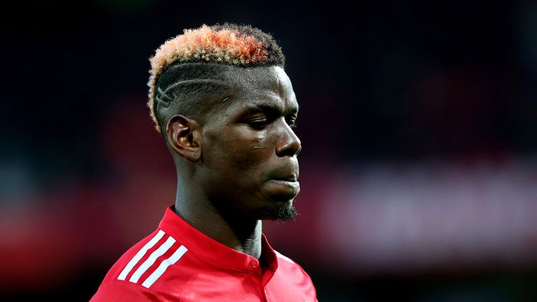 Paul Pogba looks on during the Premier League match between Manchester United and Brighton and Hove Albion at Old Trafford