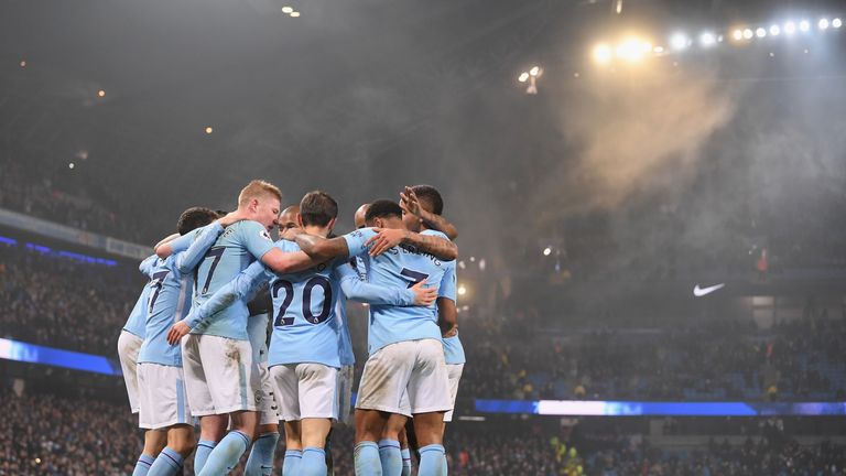 Raheem Sterling of Manchester City celebrates after scoring his side's fourth goal in the win over Tottenham at the Etihad Stadium in December 2017