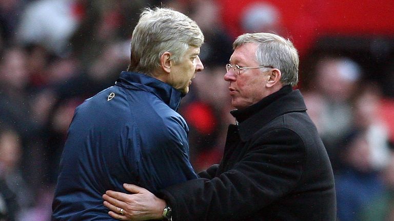 Manchester United manager Sir Alex Ferguson (R) shakes hands with Arsenal manager Arsene Wenger after a Premier League game at Old Trafford in 2008