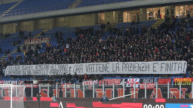 MILAN, ITALY - DECEMBER 13:  The AC Milan fans display a giant banner against Gianluigi Donnarumma before the Tim Cup match between AC Milan and Hellas Ver