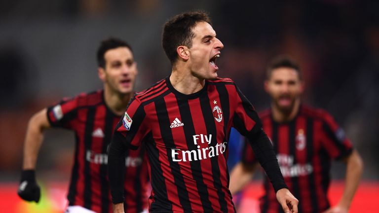 Giacomo Bonaventura (middle) celebrates after scoring for AC Milan