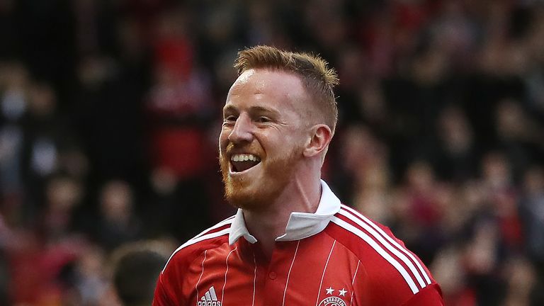 ABERDEEN, SCOTLAND - JUNE 30:  Adam Rooney of Aberdeen celebrates after he scores a penalty during the UEFA Europa League First Qualifying Round, First Leg
