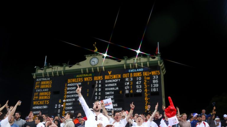 ADELAIDE, AUSTRALIA - DECEMBER 02:  (EDITOR'S NOTE: This image was created using a starburst filter.) The Barmy Army sing during day one of the Second Test