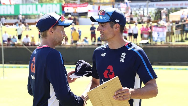 PERTH, AUSTRALIA - DECEMBER 14:  Joe Root of England presents Alastair Cook of England with his 150th Test Cap during day one of the Third Test match of th