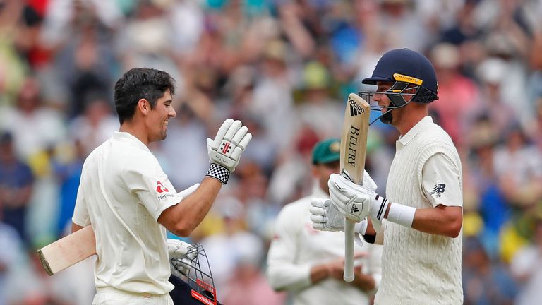 MELBOURNE, AUSTRALIA - DECEMBER 28:  Alastair Cook of England celebrates reaching his double century with Stuart Broad during day three of the Fourth Test 