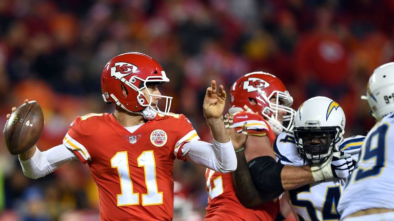 KANSAS CITY, MO - DECEMBER 16:  Quarterback Alex Smith #11 of the Kansas City Chiefs passes during the game against the Los Angeles Chargers at Arrowhead S