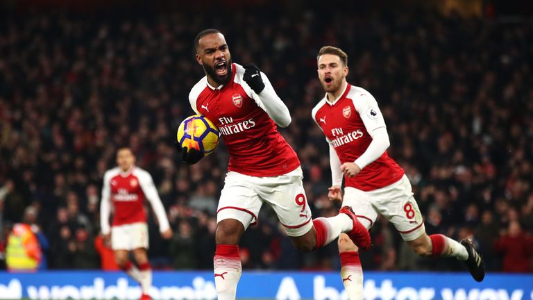 Alexandre Lacazette celebrates after scoring Arsenal's first goal