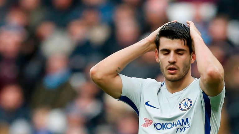 Alvaro Morata reacts after missing a chance