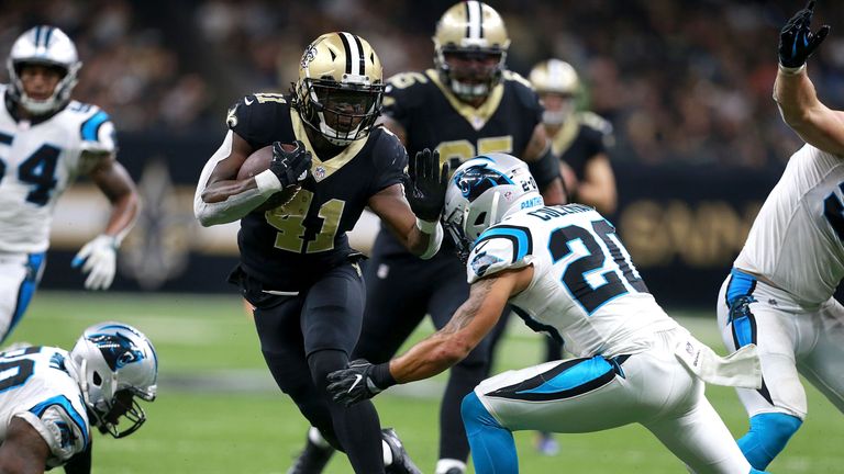 NEW ORLEANS, LA - DECEMBER 03:  Alvin Kamara #41 of the New Orleans Saints runs the ball against the Carolina Panthers during the second half of a NFL game