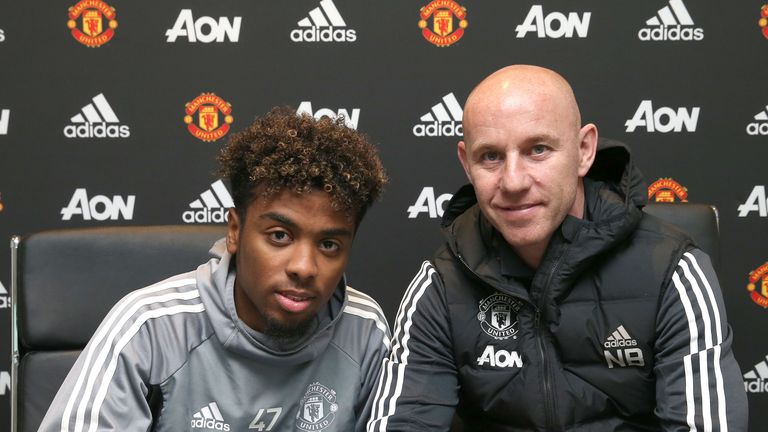 Angel Gomes of Manchester United signs his first professional contract