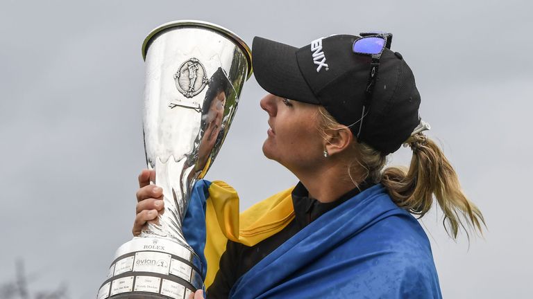 Anna Nordqvist from Sweden kisses her trophy after winning the Evian Championship tournament on September 17, 2017 in the French Alps town of Evian-les-Bai