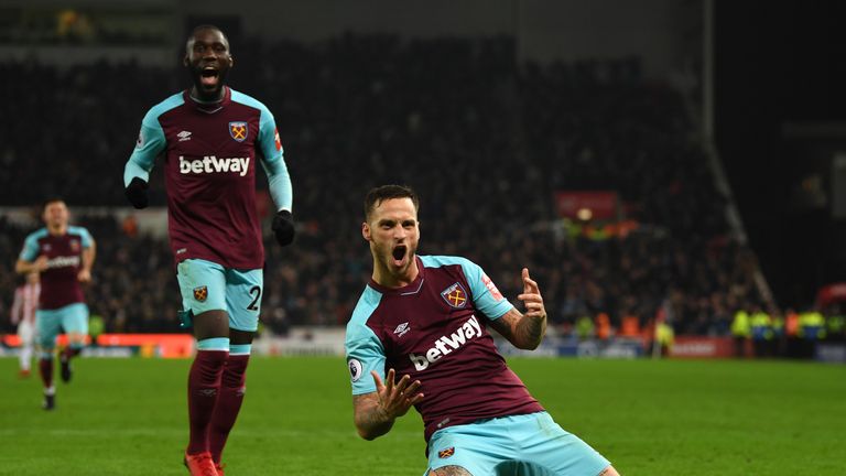 Marko Arnautovic celebrates after scoring his side's second goal