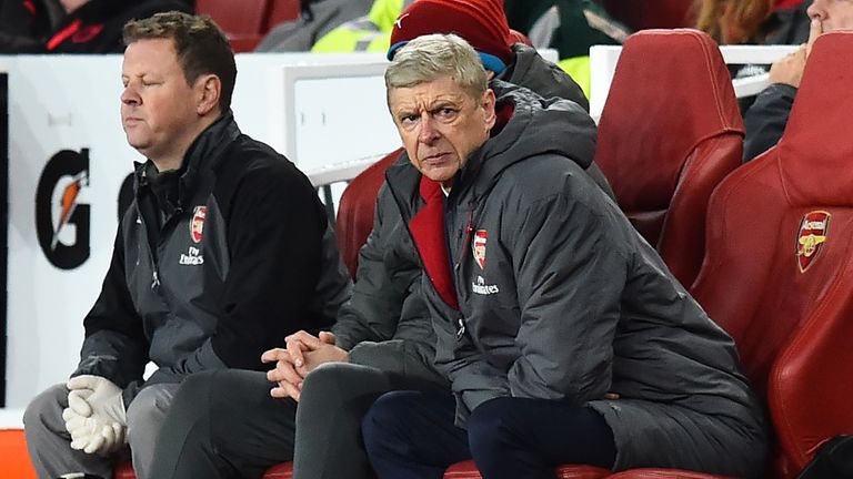 Arsene Wenger looks on from the bench at the Emirates Stadium