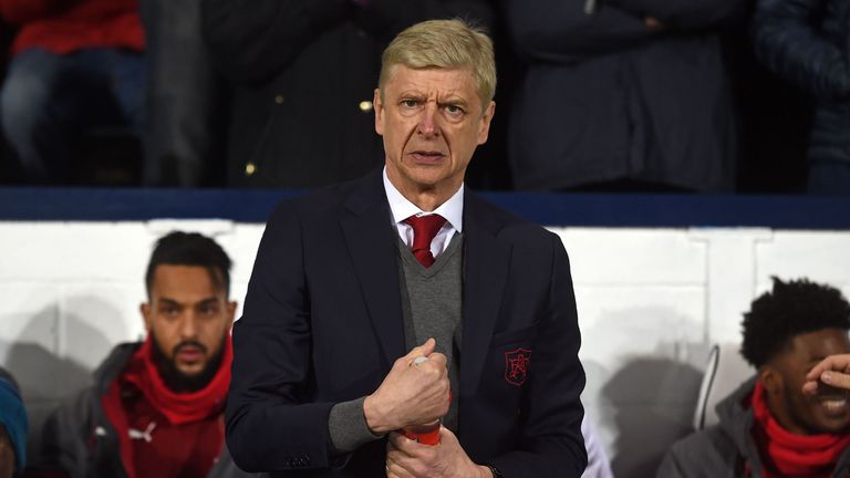 Arsenal's French manager Arsene Wenger awaits kick off in the English Premier League football match between West Bromwich Albion and Arsenal at The Hawthor