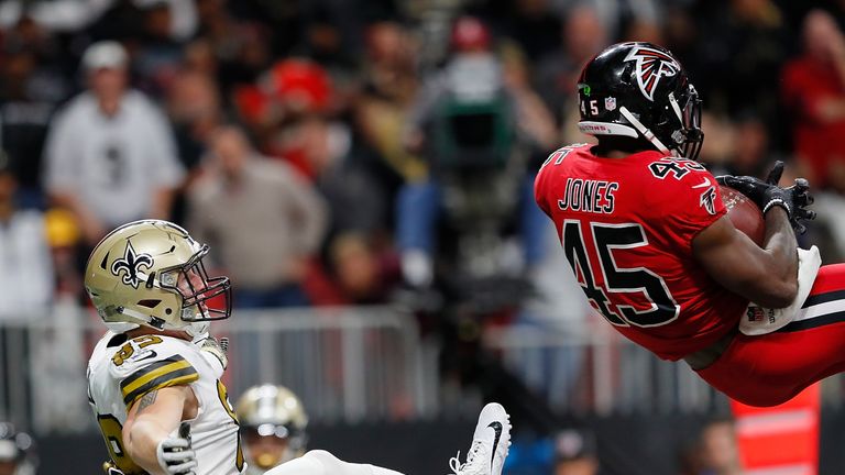 ATLANTA, GA - DECEMBER 07:  Deion Jones #45 of the Atlanta Falcons intercepts a touchdown pass intended for Willie Snead #83 of the New Orleans Saints at M