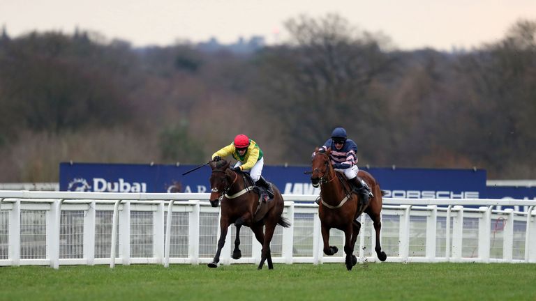 Benatar (right) ridden by Jamie Moore gets up to deny Finian's Oscar