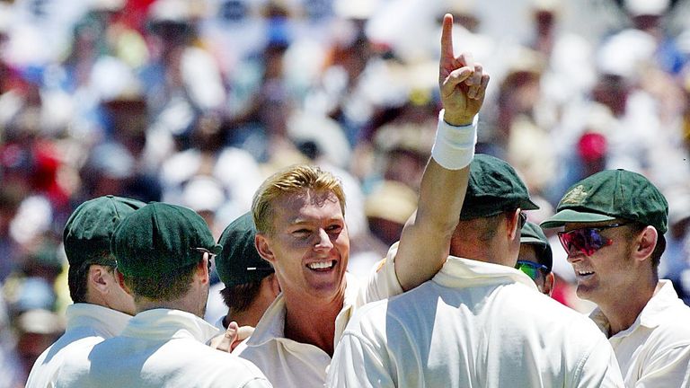 Australian fast bowler Brett Lee (C) celebrates taking the wicket of Marcus Trescothik from England for 34 runs, 29 November 2002.  Australia is attempting