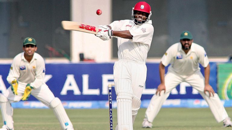 Multan, PAKISTAN:  West Indies cricket team captain Brian Lara (C) plays a stroke as Pakistani skipper Inzamam-ul-Haq (R) and his teammate Kamran Akmal (L)