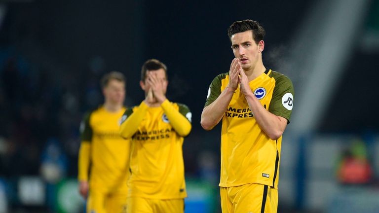 Lewis Dunk applauds the Brighton fans after their 2-0 defeat at Huddersfield