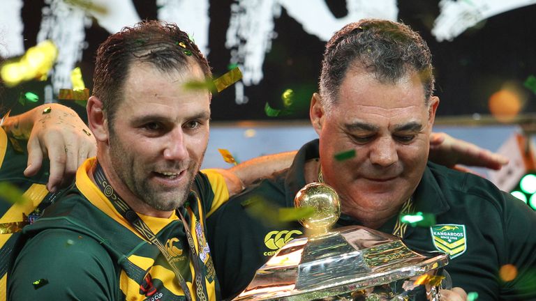 Australia's captain Cameron Smith, left and coach Mal Maninga with the Rugby League World Cup trophy
