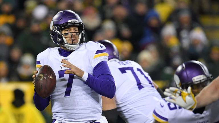 GREEN BAY, WI - DECEMBER 23:  Case Keenum #7 of the Minnesota Vikings drops back to pass during the first half against the Green Bay Packers at Lambeau Fie