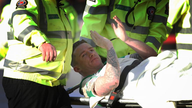 DUNDEE, SCOTLAND - DECEMBER 26:  Jonathan Hayes of Celtic is stretchered off during the Scottish Premier League match between Dundee and Celtic at  Dens Pa