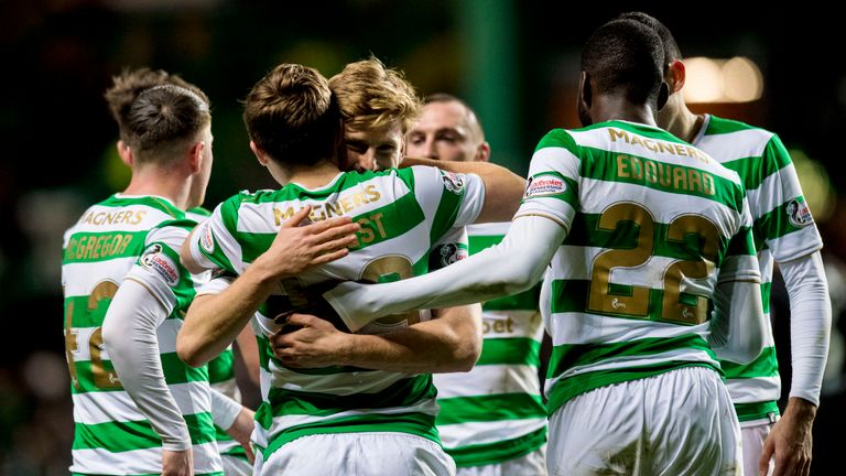 Celtic celebrate after hitting past past Motherwell