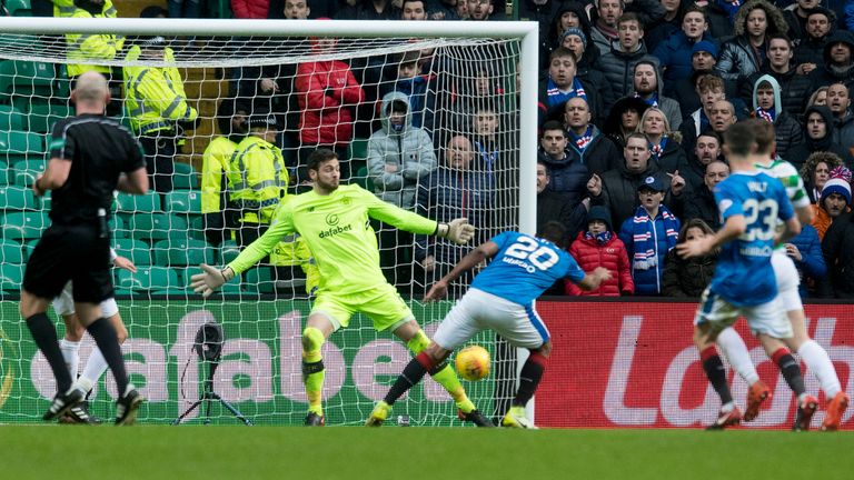 Celtic goalkeeper Craig Gordon (centre) pulls off a save to deny Alfredo Morelos