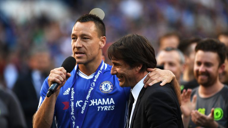 LONDON, ENGLAND - MAY 21:  John Terry of Chelsea and Antonio Conte, Manager of Chelsea celebrate after the Premier League match between Chelsea and Sunderl