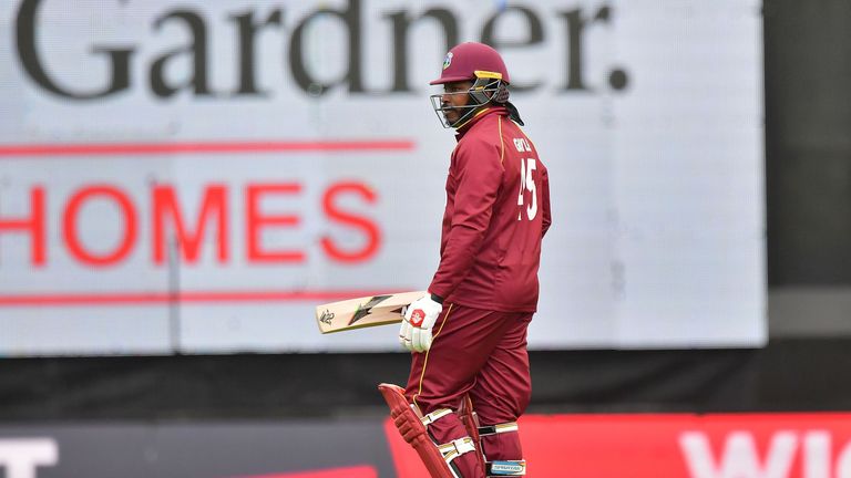West Indies batsman Chris Gayle walks from the field after being dismissed during the third one-day international (ODI) cricket match between New Zealand a