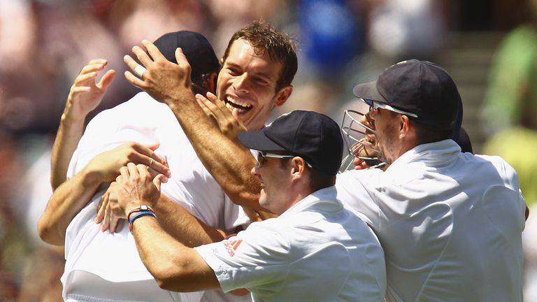 MELBOURNE, AUSTRALIA - DECEMBER 26:  Chris Tremlett of England is congratulated by team-mates after taking the wicket of Ricky Ponting of Australia during 