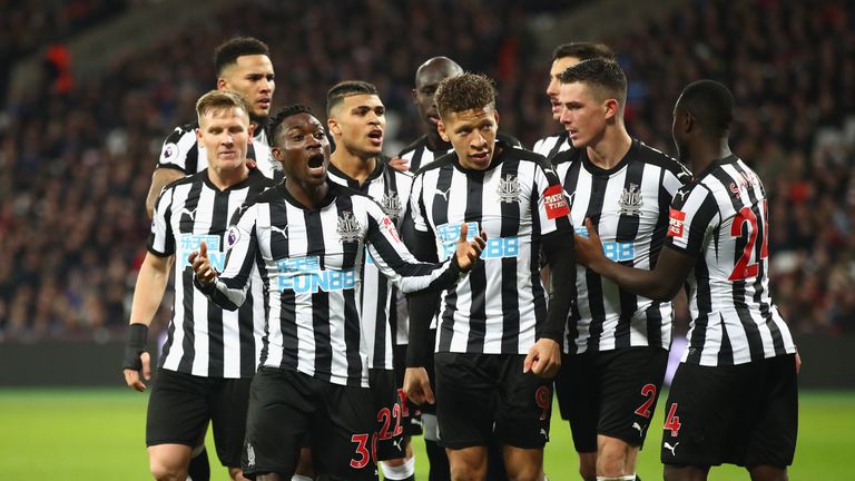 Christian Atsu celebrates after scoring Newcastle's third