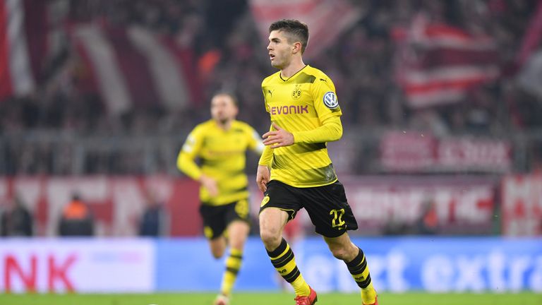 Christian Pulisic of Dortmund plays the ball during the DFB Cup match between Bayern Munich and Borussia Dortmund
