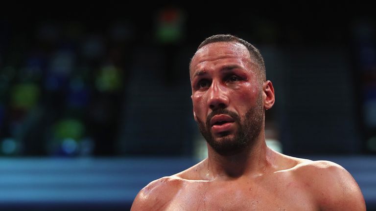 LONDON, ENGLAND - DECEMBER 09:  James DeGale looks dejected as he loses to Caleb Truax in the IBF World Super-Middleweight Championship fight at Copper Box