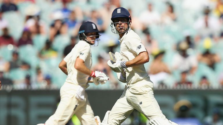 MELBOURNE, AUSTRALIA - DECEMBER 27:  Alastair Cook of England (R) and Joe Root run during day two of the Fourth Test Match in the 2017/18 Ashes series betw