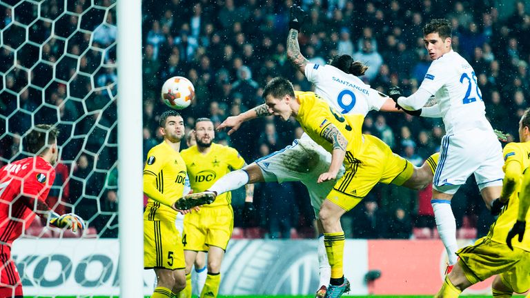 Copenhagen's Pieros Sotiriou (C) heads to score a goal during the UEFA Europa League group F football match FC Copenhagen vs FC Sheriff Tiraspol on Decembe