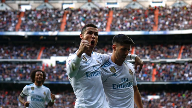 Cristiano Ronaldo celebrates scoring Real Madrid's second goal Marco Asensio 
