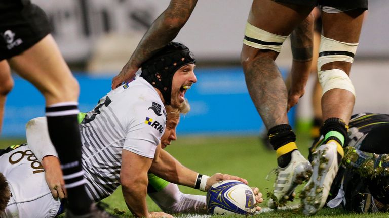 NORTHAMPTON, ENGLAND - DECEMBER 09: Dan Evans of Ospreys scores a try during the European Rugby Champions Cup match between Northampton Saints and Ospreys 