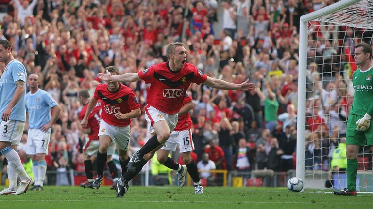 Darren Fletcher celebrates scoring their third goal during the Premier League match between Manchester United and Manchester City at Old Trafford