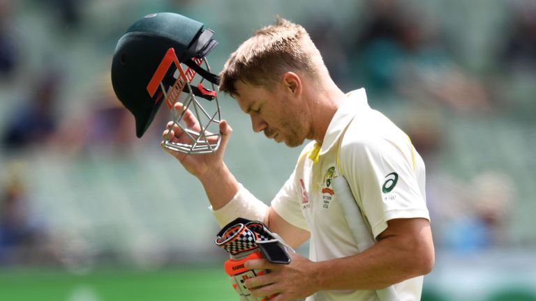 Australia's batsman David Warner walks off after being dismissed by England on the final day of the fourth Ashes cricket Test match at the MCG in Melbourne